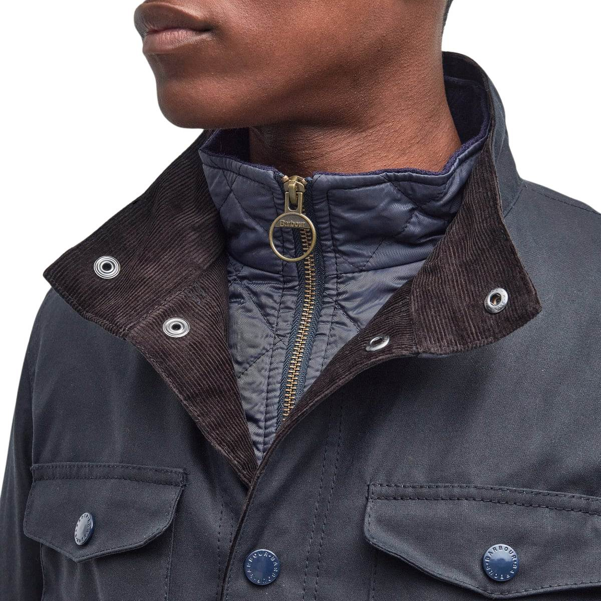 Barbour Ogston Wax Jacket Navy, Stijlvolle outdoorjas in robuust gewaxed katoen.