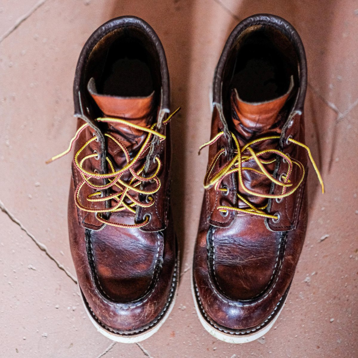 Red Wing 875 Classic Moc Toe Boot in Oro Legacy leather is the perfect blend of craftsmanship, durability, and timeless design